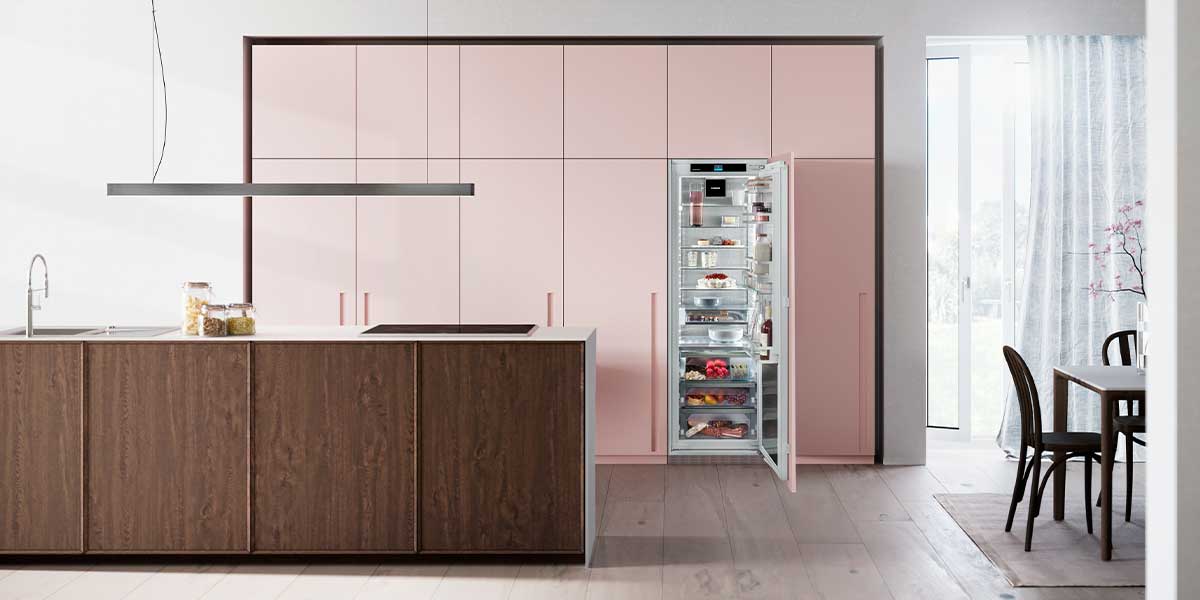 Liebherr integrated fridge sitting flush within kitchen cabinetry